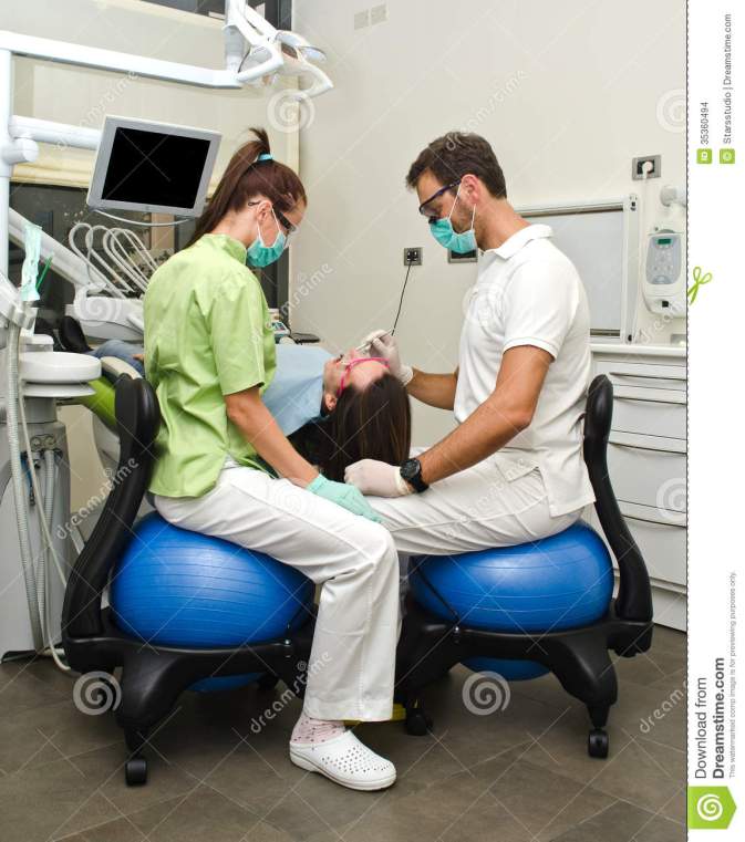 dentist-assistant-patient-dental-clinic-working-35360494